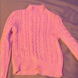 This pink sweater